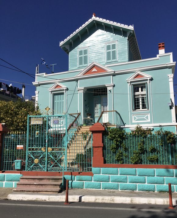 This seems to be a typical style of house in Mytilene, but not a usual color! Very different than most islands, buy very interesting I think. 