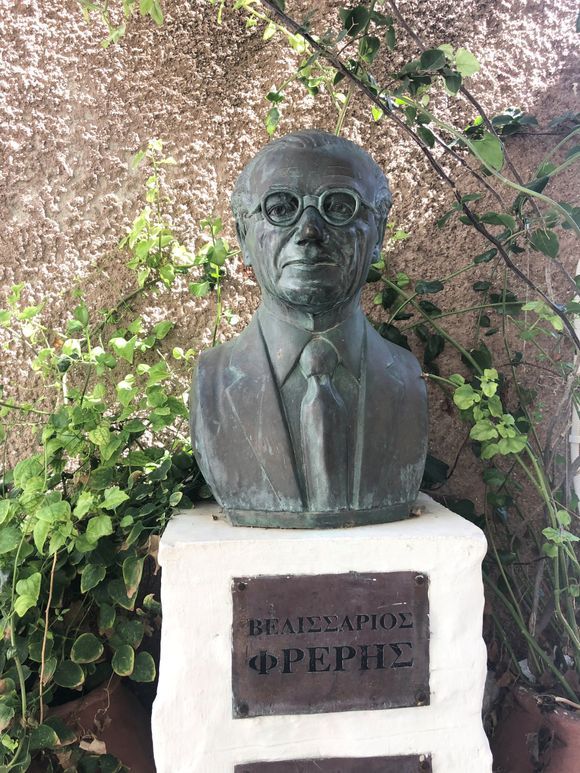 Can someone tell me who this man is and why he has been honored with a statue in Ano Syros?