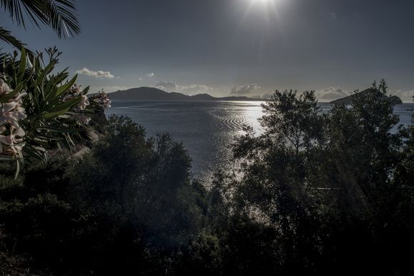 Marathonissi Island under the glow of the full moon on