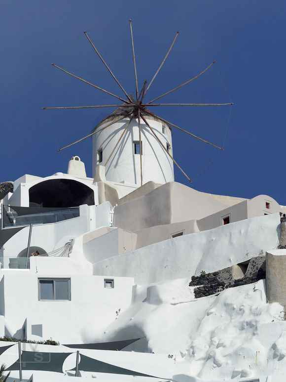 Looking up at Oia from Ammoudi.