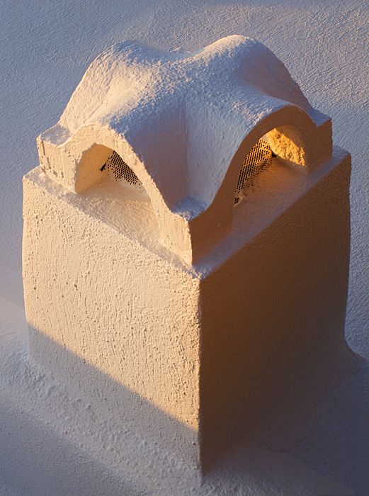 Chimney pot - evening light in Firostefani