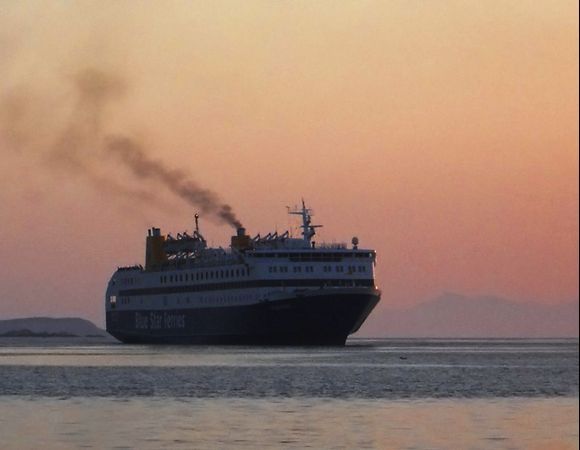 Blue Star ferry arriving in Parikia at sunset