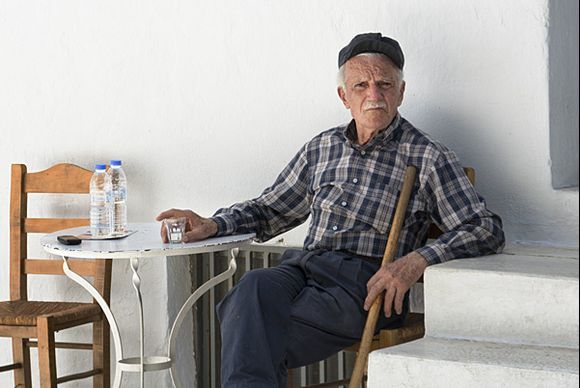 For Cristina: Same man, same chair, same expression. Taken in 2013.