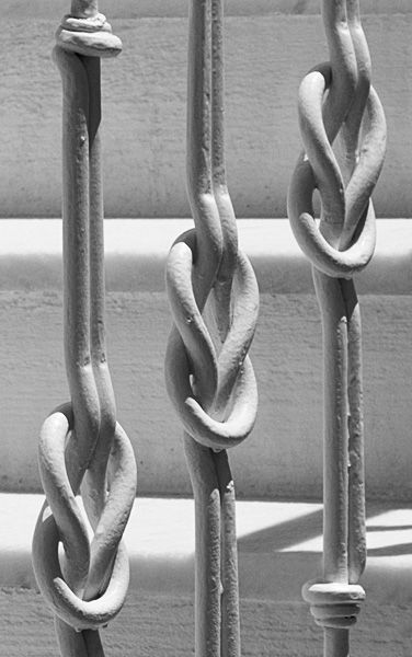 Knots in the stair railing
