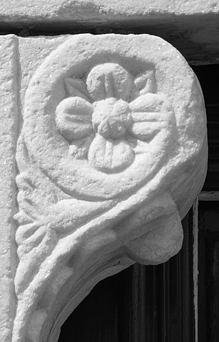 Marble detail at corner of a door in old Parikia.