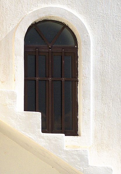 Kostos church window with stairs