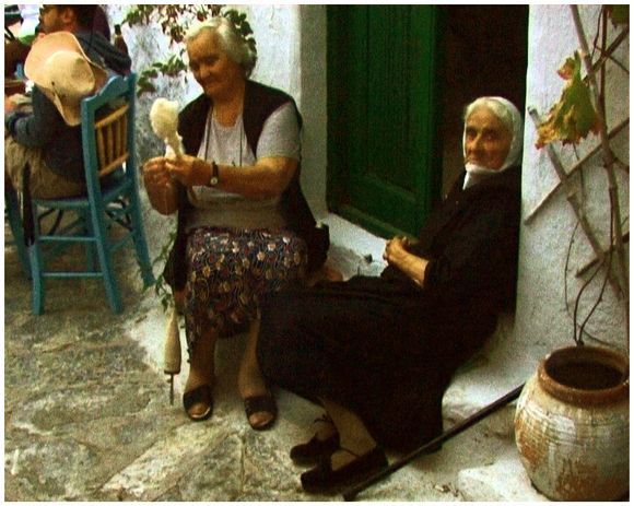Working the wool at the doorstep. Amorgos, 2006