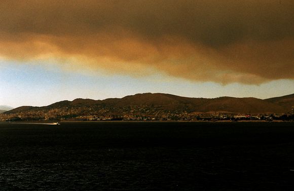 Forest fire cloud over the harbour. Piraeus, 2007