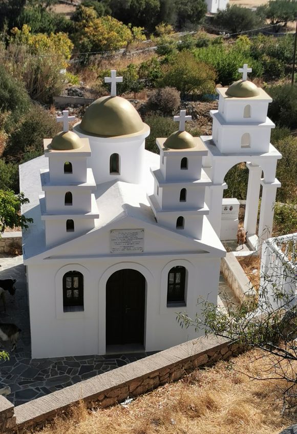 Agios Stiiianos Church seen from the road above with its green golden domes.

October 8, 2021 