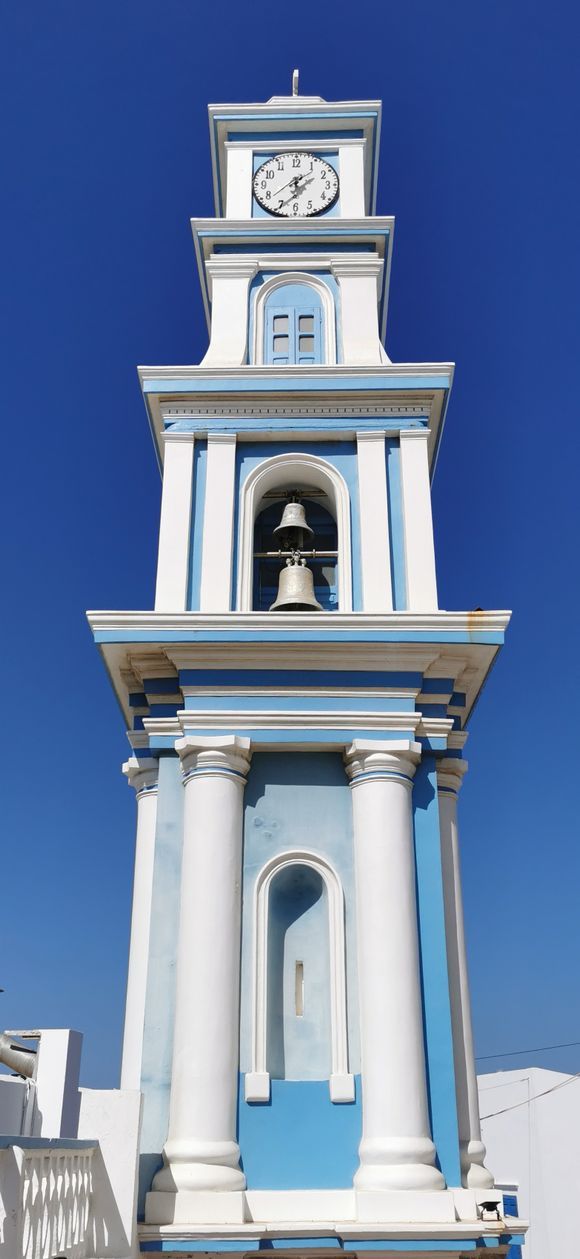 Clock tower at Saint's Spiridon Holy Chapel in Fri on the island of Kasos. 

October 6, 2021