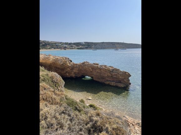 You need to walk to the right of the beach to find the small cave 