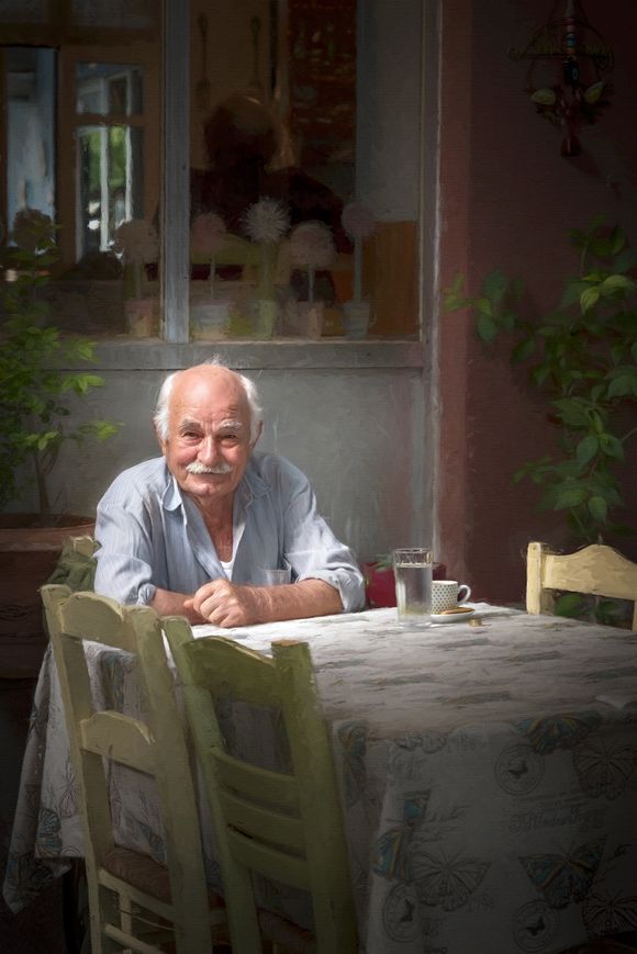 One of the locals enjoying a Greek coffee in a taverna in Loutropolis Thermis near Mytilini.