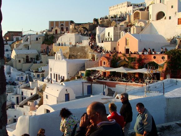 Crowds gather to watch the sunset at Oia.