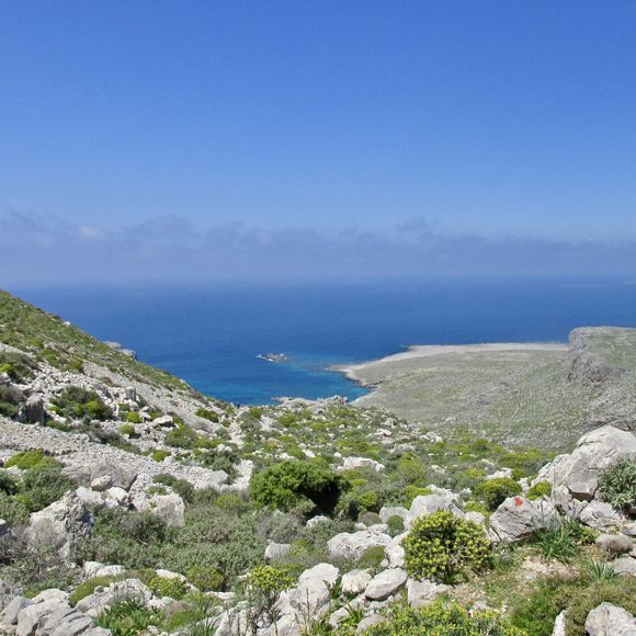 Hiking to the beautiful bay of Vroukounda in spring.