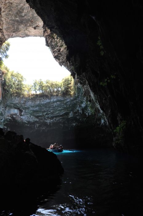 Boat in Melissani cave at midday