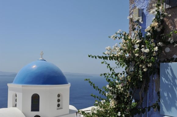 blue church and white bouganville