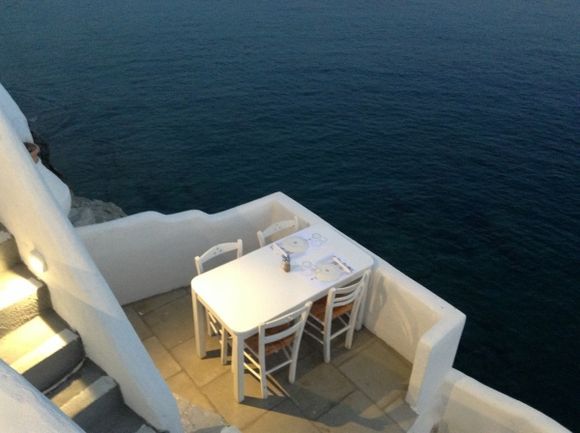 We eat on a terrace overlooking the sea