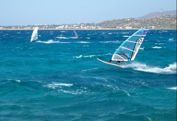 Windsurfing in the beautiful bay of Mikri Vigla on Naxos Island.