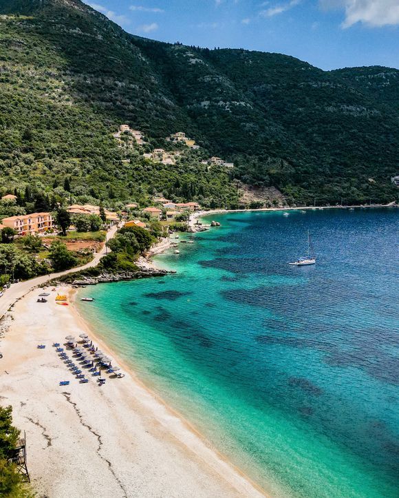 Mikros Gialos Beach, lefkada on a partly cloudy day.