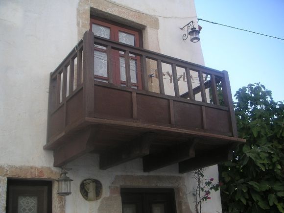 Wood balcony in Agia Marina