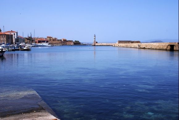 View of the old port of Chania, and the Venetian lighthouse in the back.