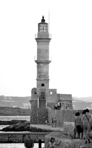 Black and white lighthouse in old port of Chania