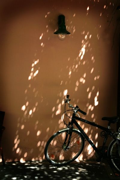 Bike in dappled light, Rethymno.