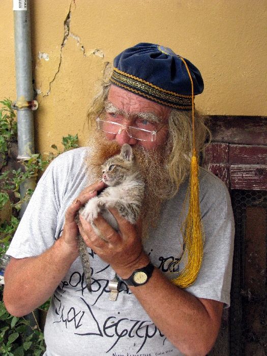 A Man with a Cat. Plaka.