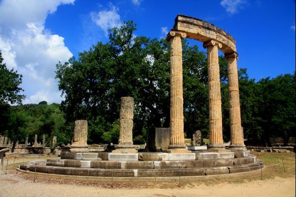 The Philippeion (Greek: Φιλιππεῖον) in the Altis of Olympia was an Ionic circular memorial in limestone and marble, a tholos, which contained chryselephantine (ivory and gold) statues of Philip's family; himself, Alexander the Great, Olympias, Amyntas III and Eurydice I. It was made by the Athenian sculptor Leochares in celebration of Philip's victory at the battle of Chaeronea (338 BC). It was the only structure inside the Altis dedicated to a human.