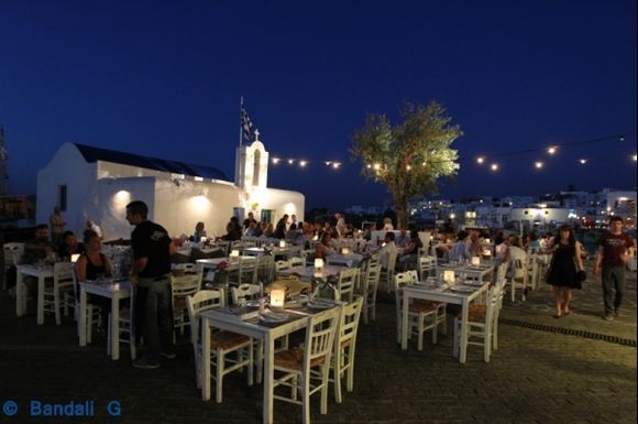 church in naoussa near fisherman port rmantic dinner candles and lights