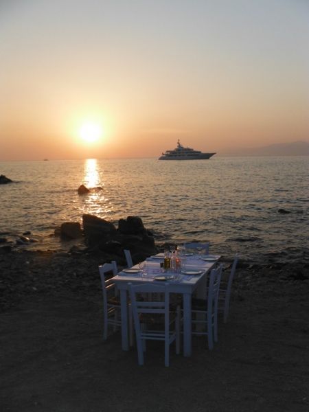 Sunset dinner near the beach in mykonos town