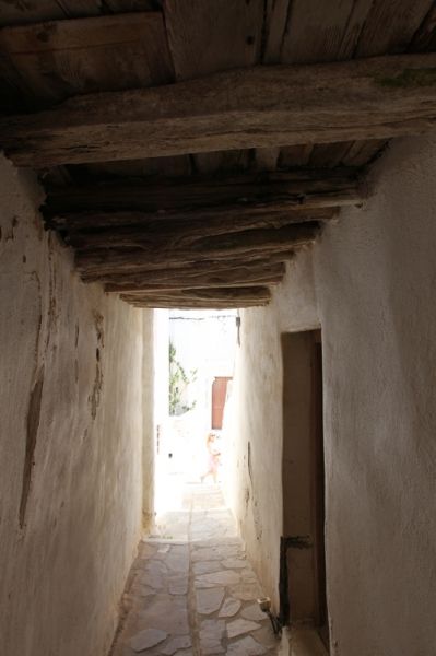 Naxos town narrow streets  wiod above