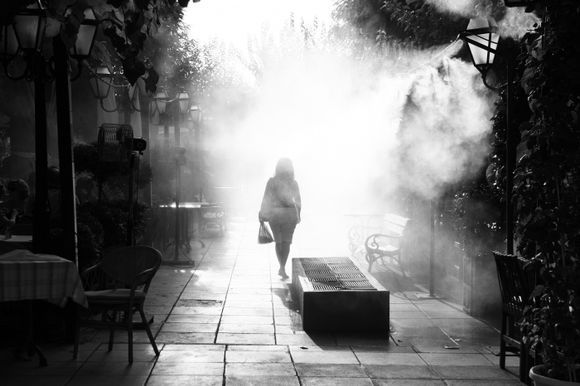 coolness of the water mist on a hot Athenian day