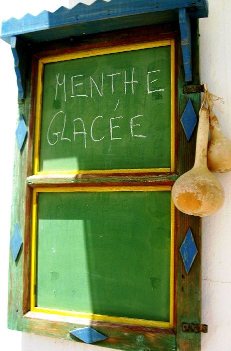 A greek sign outside a restuarant in Lefkes, Paros.