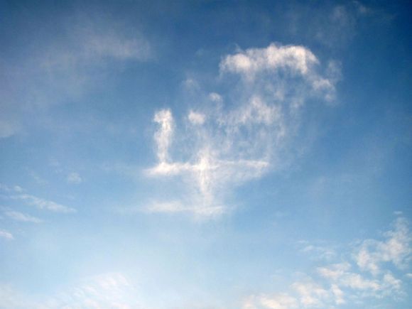 A 4? A broken swastika? A skull next to it? Weird cloud formation above Artemis on 23-10-2011