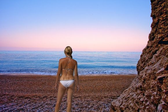 Tourist girl at Egremni Beach.