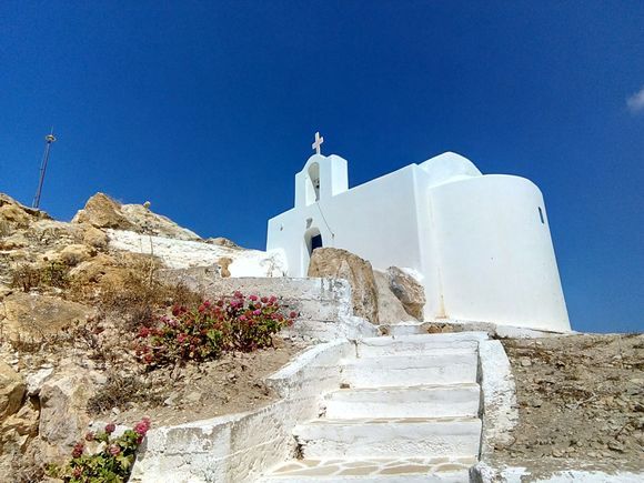 Climbing against the wind on the Chora's highest point