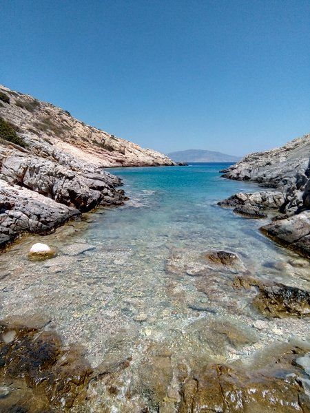 Secluded cove between Agios Georgios and Dhialiskari, reachable only by boat or on a long path