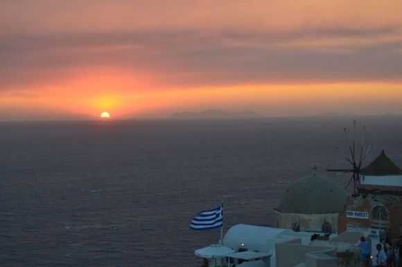 The romantic sunset view from Oia, Santorini taken in August