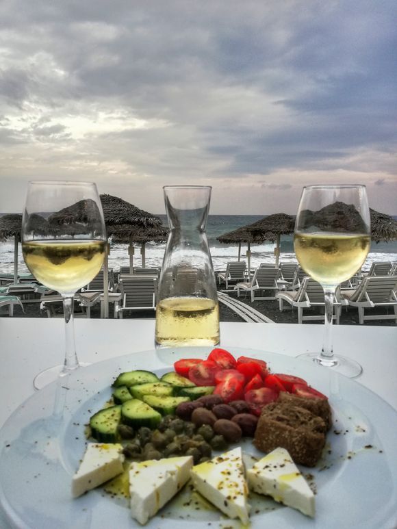 Meze and local wine at the beach