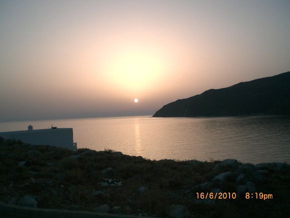 Sunset Aegialis bay
