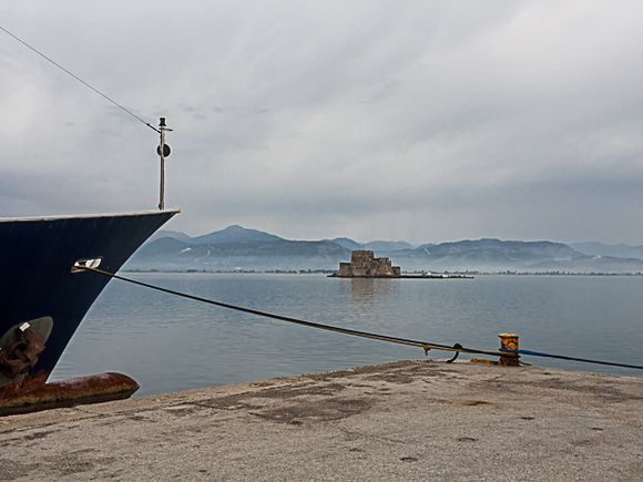 Harbor scene with Bourtzi Fortress in backgound.