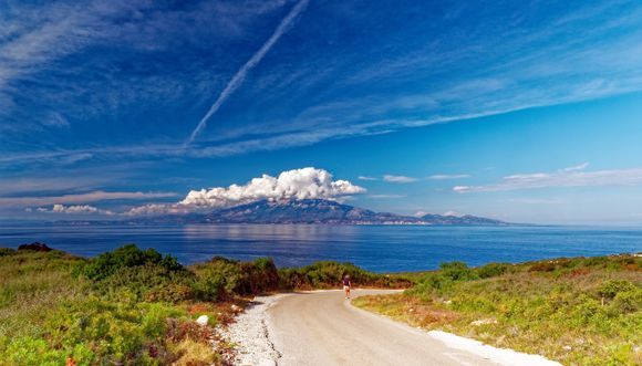 Kefalonia with some clouds over Mount Ainos. View from Cape Skinari in Zakynthos.