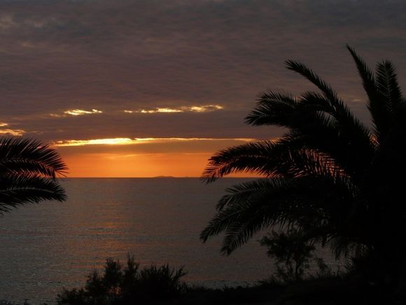 Sunset at the bay opposite Antiparos village