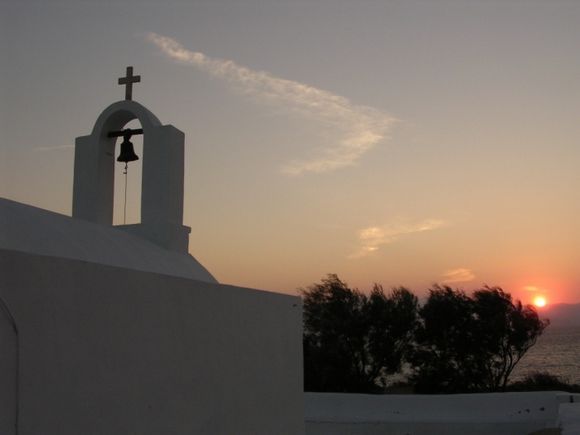 White chapel at sunset in Aghia Anna Naxos