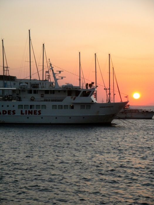 Express Skopelitis resting in Katapola harbour at sunset