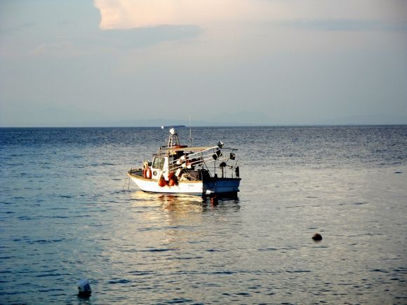 Boat in the little harbour of Agios Nikitas