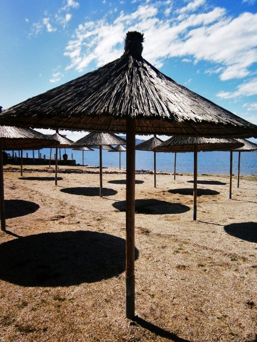 Chinese shadows in Plakes beach