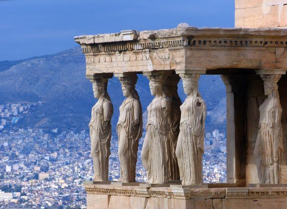 The Karyatides sisters overlooking Athens from their balcony