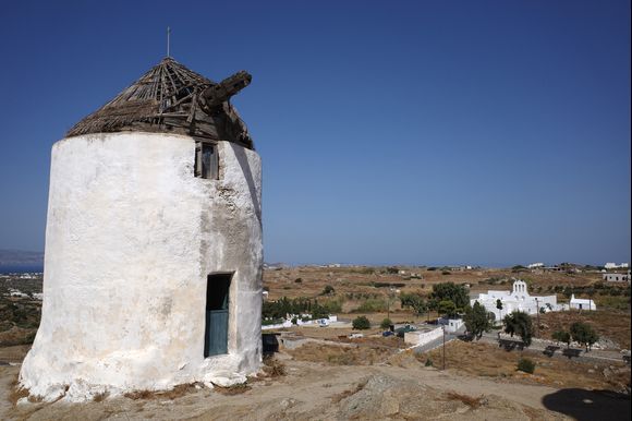 Traditional windmill in vilage Vivlos.